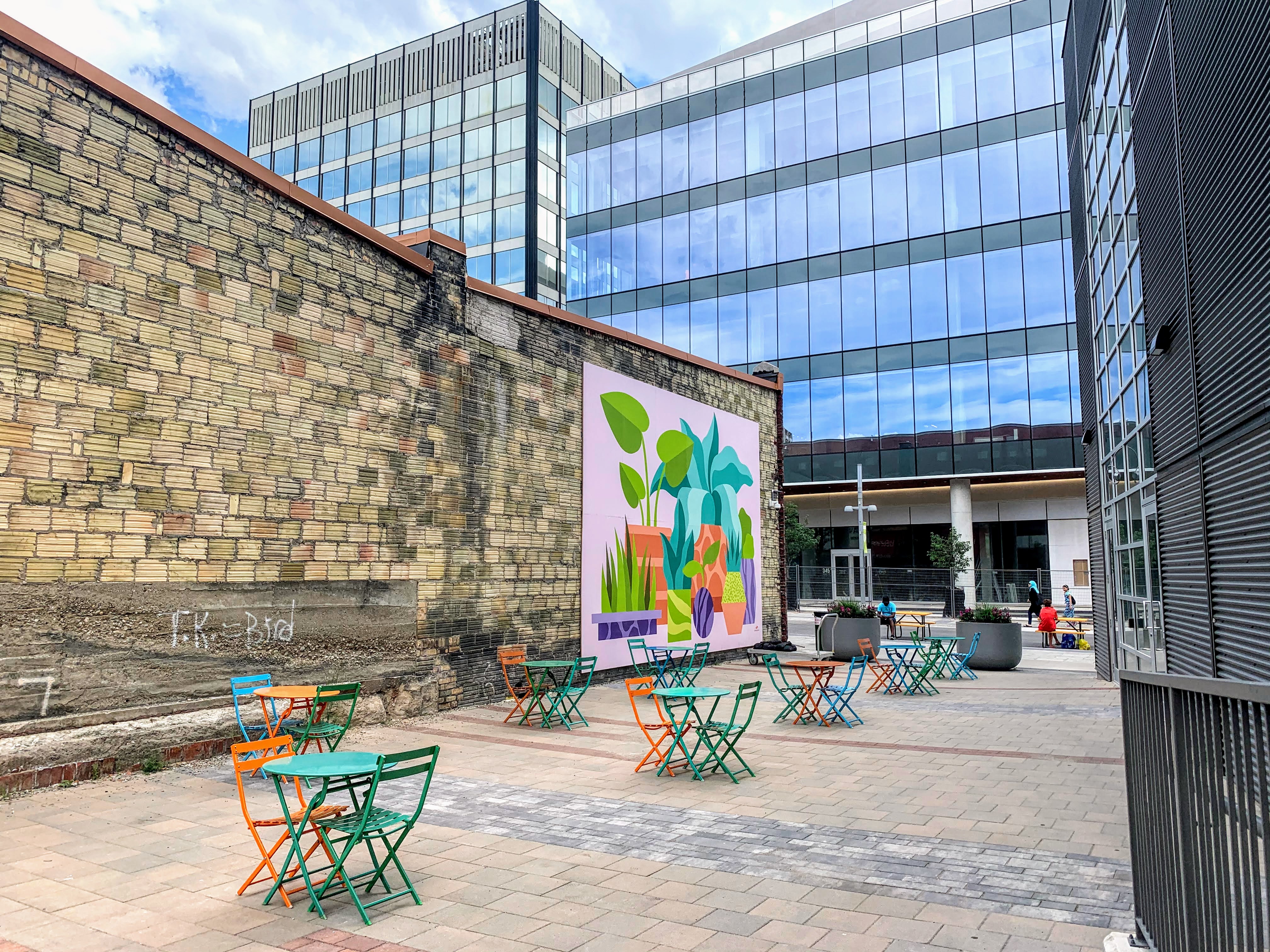 bistro tables and chairs set up on patio